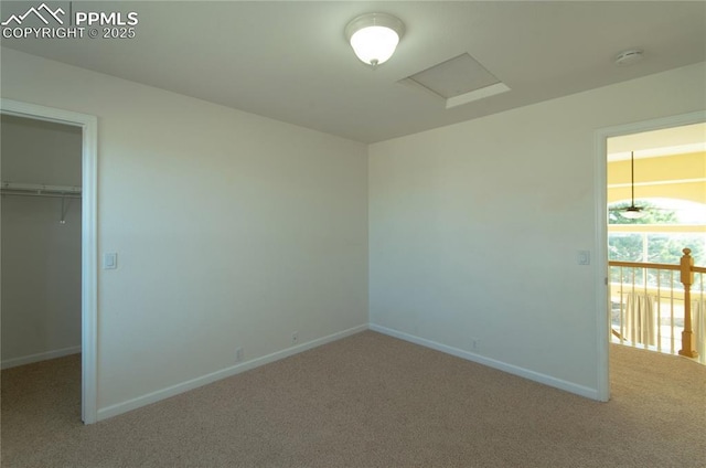 9443 St George Rd, Peyton, CO 80831 - unfurnished room with attic access, baseboards, and carpet floors
