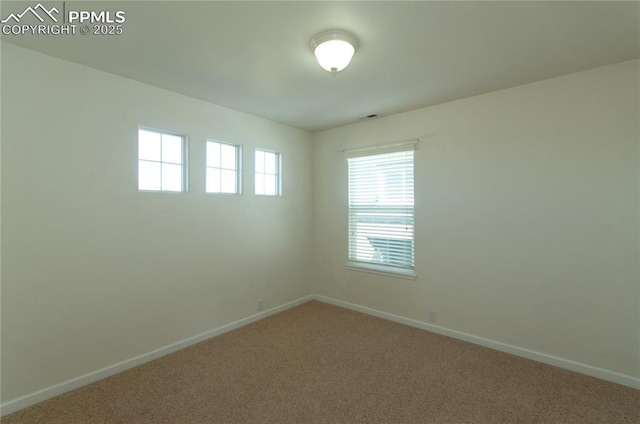 9443 St George Rd, Peyton, CO 80831 - carpeted empty room featuring visible vents and baseboards