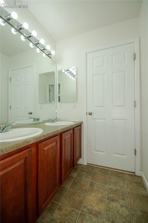 9443 St George Rd, Peyton, CO 80831 - full bathroom with a sink and double vanity