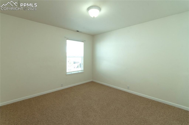 9443 St George Rd, Peyton, CO 80831 - carpeted spare room featuring visible vents and baseboards