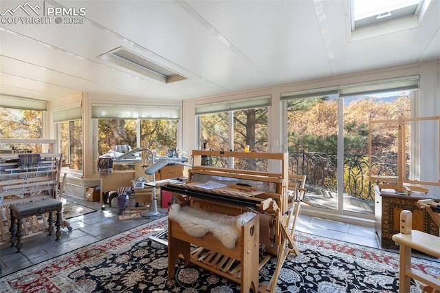 714 Southern Cross Pl, Colorado Springs, CO 80906 - sunroom / solarium with stone tile flooring