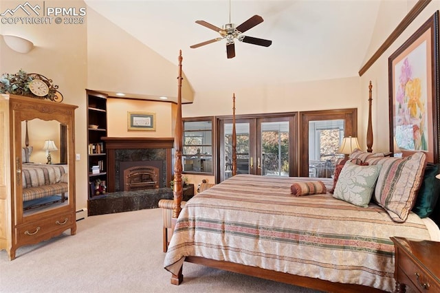 714 Southern Cross Pl, Colorado Springs, CO 80906 - bedroom featuring a fireplace, carpet flooring, french doors, high vaulted ceiling, and a baseboard radiator