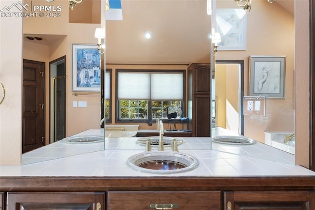 714 Southern Cross Pl, Colorado Springs, CO 80906 - kitchen with tile countertops and a sink