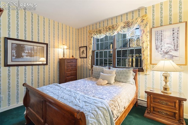 714 Southern Cross Pl, Colorado Springs, CO 80906 - bedroom with carpet, a baseboard heating unit, and wallpapered walls