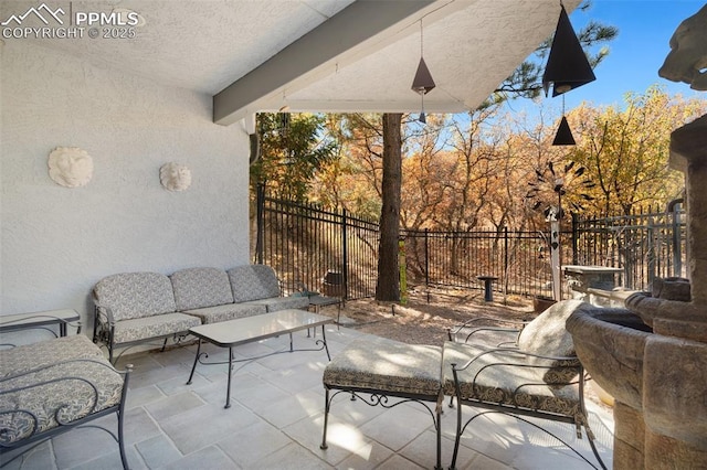 714 Southern Cross Pl, Colorado Springs, CO 80906 - view of patio featuring an outdoor living space and fence