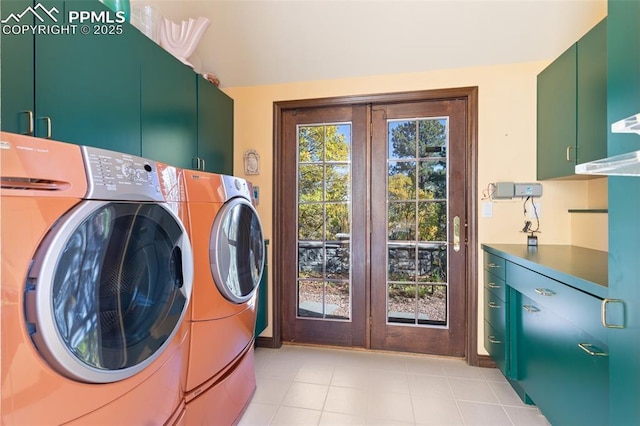 714 Southern Cross Pl, Colorado Springs, CO 80906 - laundry room with washing machine and clothes dryer and cabinet space
