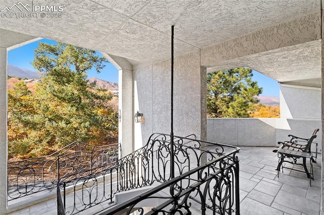 714 Southern Cross Pl, Colorado Springs, CO 80906 - balcony featuring a patio area