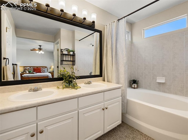 ensuite bathroom with shower / bath combination with curtain, double vanity, ensuite bathroom, and a sink