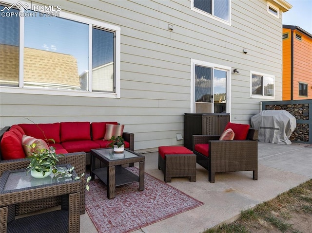 view of patio / terrace featuring an outdoor living space and a grill