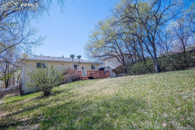 view of yard with a deck