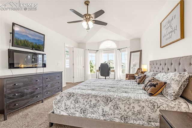 bedroom featuring ceiling fan, vaulted ceiling, and carpet floors