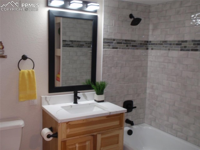 2112 Denton Grv Unit 101, Colorado Springs, CO 80919 - full bathroom with bathing tub / shower combination, vanity, and toilet
