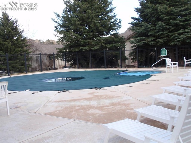 2112 Denton Grv Unit 101, Colorado Springs, CO 80919 - pool with a patio area and fence