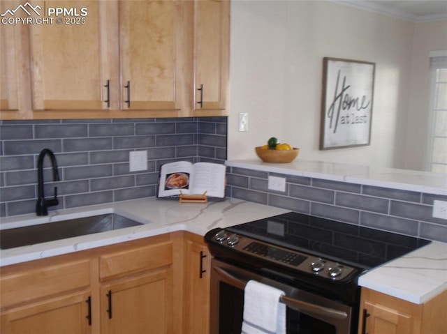 2112 Denton Grv Unit 101, Colorado Springs, CO 80919 - kitchen featuring a sink, decorative backsplash, stainless steel electric stove, and crown molding