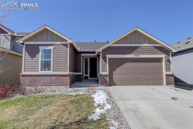 17718 Leisure Lake Dr, Monument, CO 80132 - view of front of home featuring brick siding, an attached garage, concrete driveway, and a front lawn