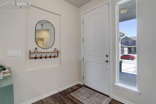 17718 Leisure Lake Dr, Monument, CO 80132 - foyer entrance featuring dark wood-style flooring and baseboards