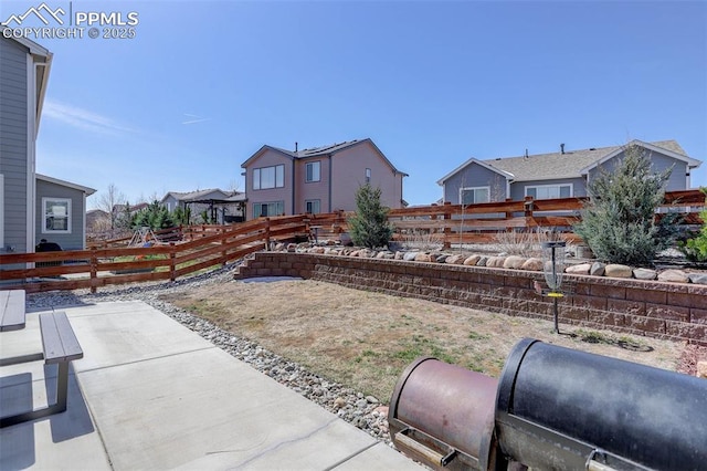 17718 Leisure Lake Dr, Monument, CO 80132 - fenced backyard with a residential view and a patio area