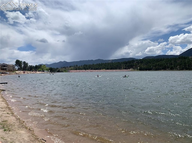 17718 Leisure Lake Dr, Monument, CO 80132 - water view featuring a mountain backdrop