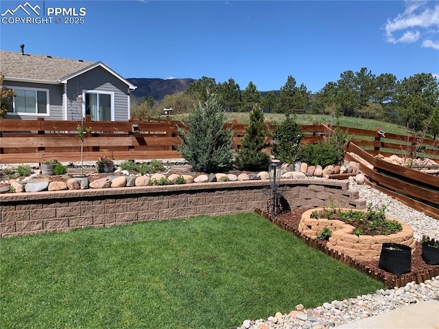 17718 Leisure Lake Dr, Monument, CO 80132 - view of yard with a garden and a mountain view