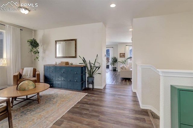 17718 Leisure Lake Dr, Monument, CO 80132 - living area featuring dark wood-style floors, recessed lighting, and baseboards