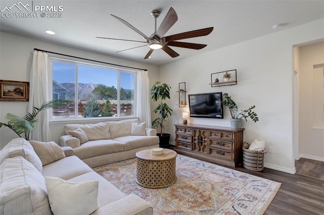 17718 Leisure Lake Dr, Monument, CO 80132 - living area featuring ceiling fan, baseboards, wood finished floors, and recessed lighting