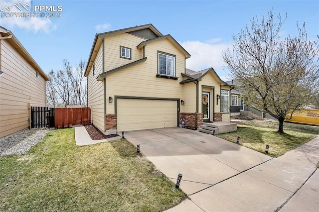 split level home featuring fence, a front lawn, driveway, brick siding, and a garage