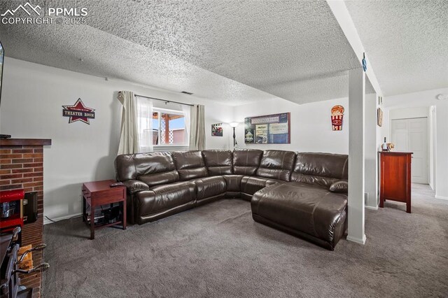 living room featuring baseboards, carpet floors, and a textured ceiling