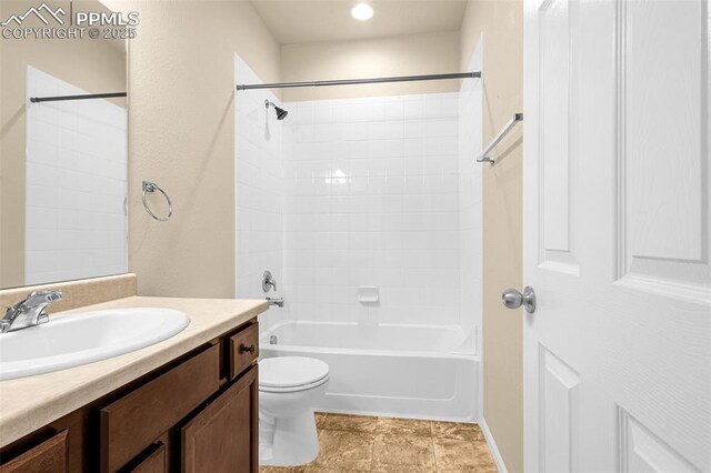 9712 Wando Dr, Colorado Springs, CO 80925 - full bathroom featuring toilet, vanity, and shower / bathtub combination
