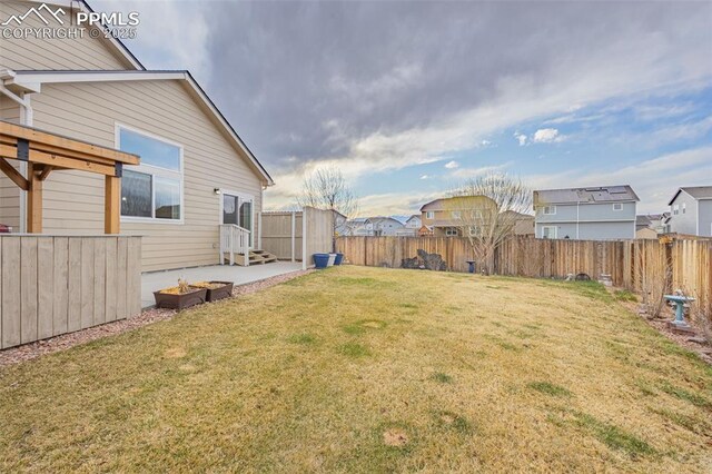 9712 Wando Dr, Colorado Springs, CO 80925 - view of yard with a fenced backyard and entry steps
