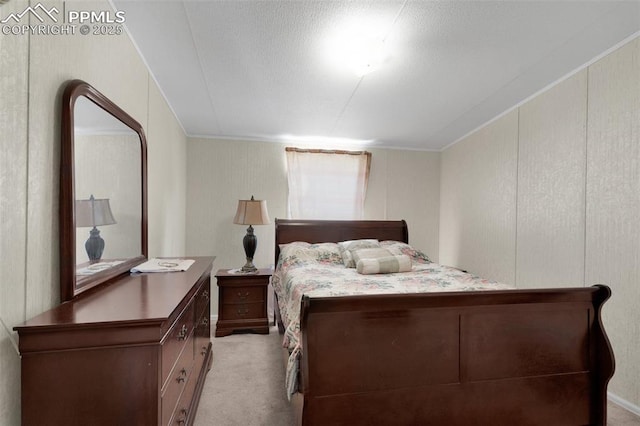 2801 Lime Rd, Pueblo, CO 81006 - bedroom with crown molding and light carpet