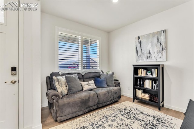 15833 Little Bluestem Rd, Monument, CO 80132 - living area with baseboards and wood finished floors