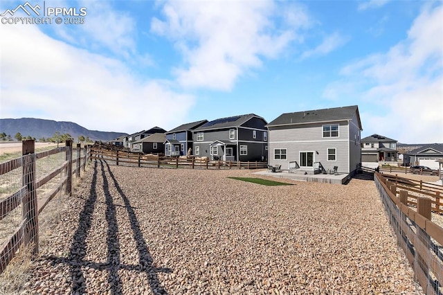 15833 Little Bluestem Rd, Monument, CO 80132 - rear view of property with a residential view, a patio area, and fence