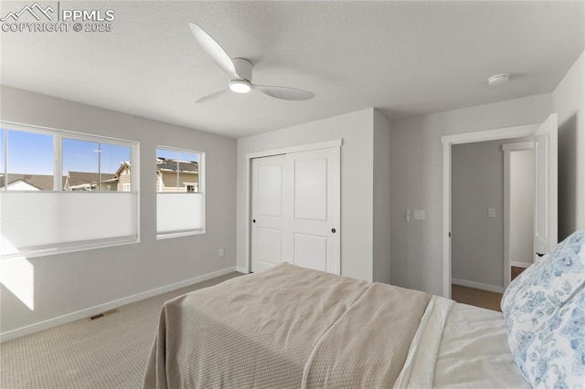 5894 Spring Breeze Dr, Colorado Springs, CO 80923 - bedroom featuring ceiling fan, a closet, visible vents, carpet flooring, and baseboards
