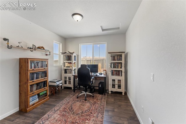 5894 Spring Breeze Dr, Colorado Springs, CO 80923 - office with a textured ceiling, baseboards, attic access, and wood finished floors