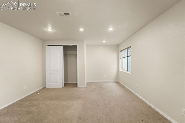795 Ridgebury Pl, Fountain, CO 80817 - unfurnished bedroom with visible vents, baseboards, a closet, recessed lighting, and light carpet