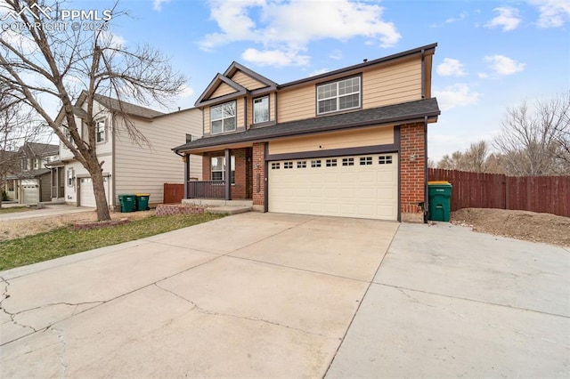 795 Ridgebury Pl, Fountain, CO 80817 - view of front of home featuring concrete driveway, a porch, brick siding, and a garage