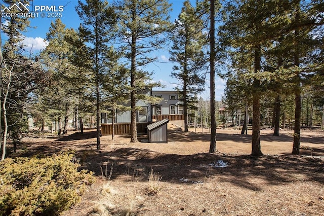 view of yard featuring a deck