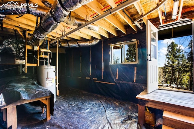 below grade area featuring electric water heater