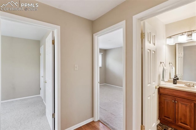 2928 Drakestone Dr, Colorado Springs, CO 80909 - bathroom with vanity and baseboards