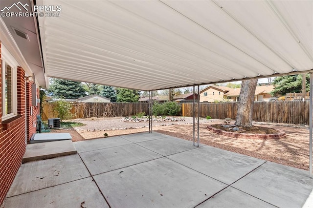 2928 Drakestone Dr, Colorado Springs, CO 80909 - view of patio with a fenced backyard and central AC unit