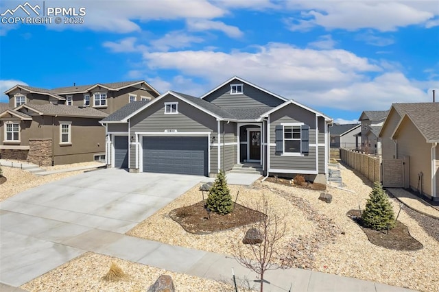 12980 Stone Valley Dr, Peyton, CO 80831 - view of front of property with driveway, an attached garage, and a residential view