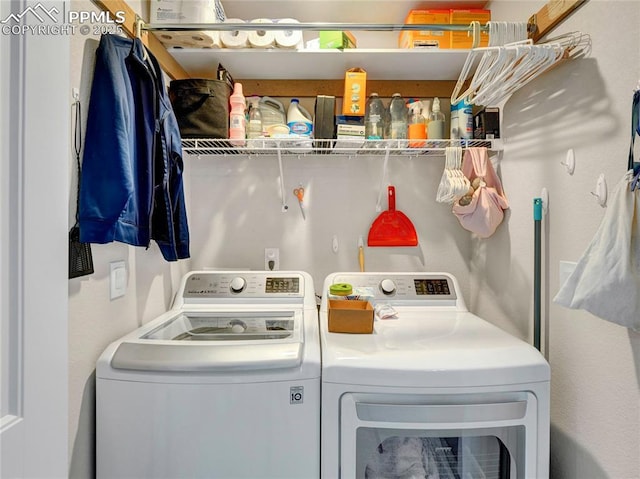 laundry area featuring laundry area and separate washer and dryer