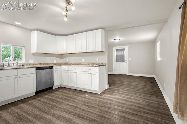 738 Harrison Pl, Colorado Springs, CO 80905 - kitchen featuring a sink, dishwasher, dark wood-style flooring, and white cabinetry