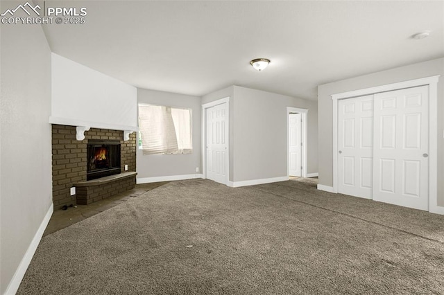 738 Harrison Pl, Colorado Springs, CO 80905 - unfurnished living room with carpet flooring, baseboards, and a brick fireplace