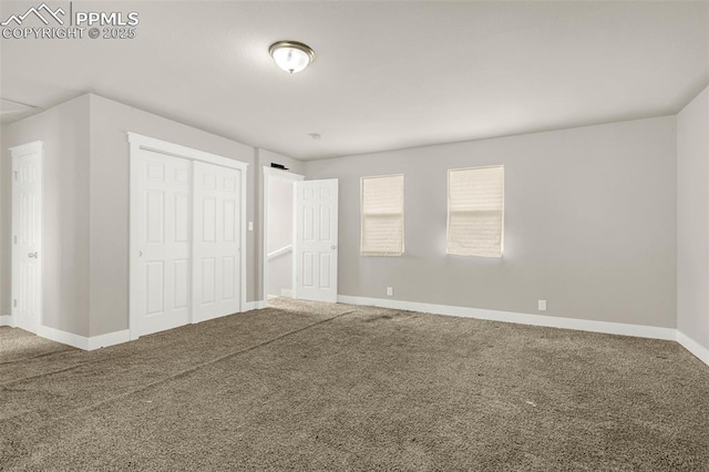 738 Harrison Pl, Colorado Springs, CO 80905 - unfurnished bedroom with carpet floors, a closet, and baseboards