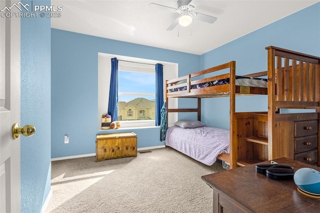 2951 Poughkeepsie Dr, Colorado Springs, CO 80916 - carpeted bedroom with baseboards and a ceiling fan