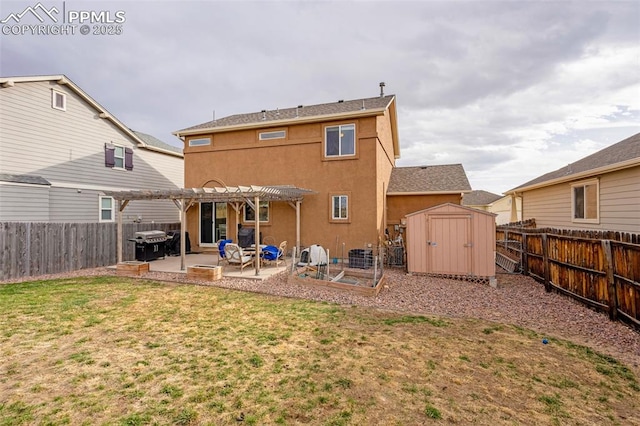2951 Poughkeepsie Dr, Colorado Springs, CO 80916 - rear view of house featuring an outbuilding, a pergola, a storage shed, stucco siding, and a patio area