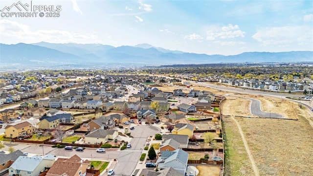 2951 Poughkeepsie Dr, Colorado Springs, CO 80916 - aerial view with a mountain view and a residential view