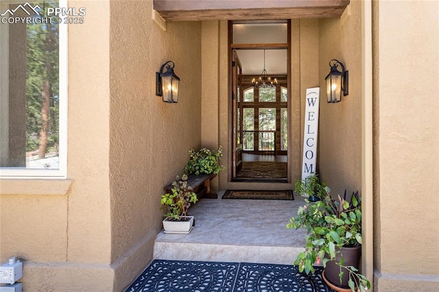 18383 Lazy Summer Way, Monument, CO 80132 - doorway to property with stucco siding and a porch