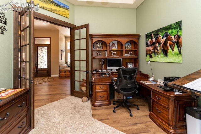 18383 Lazy Summer Way, Monument, CO 80132 - home office featuring french doors and light wood-type flooring